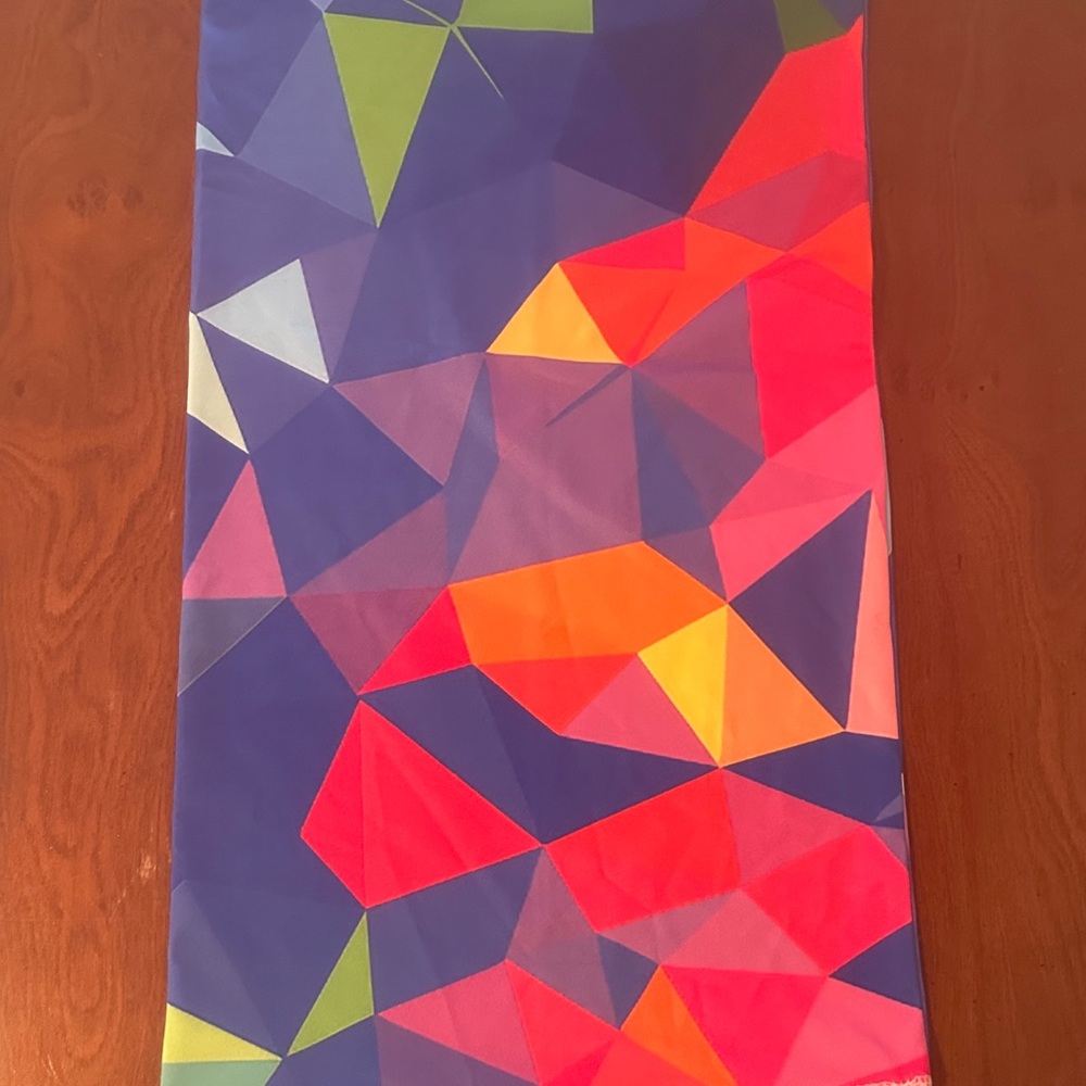 Brand new geometric multicolor neckie for skiing or other outdoor sports